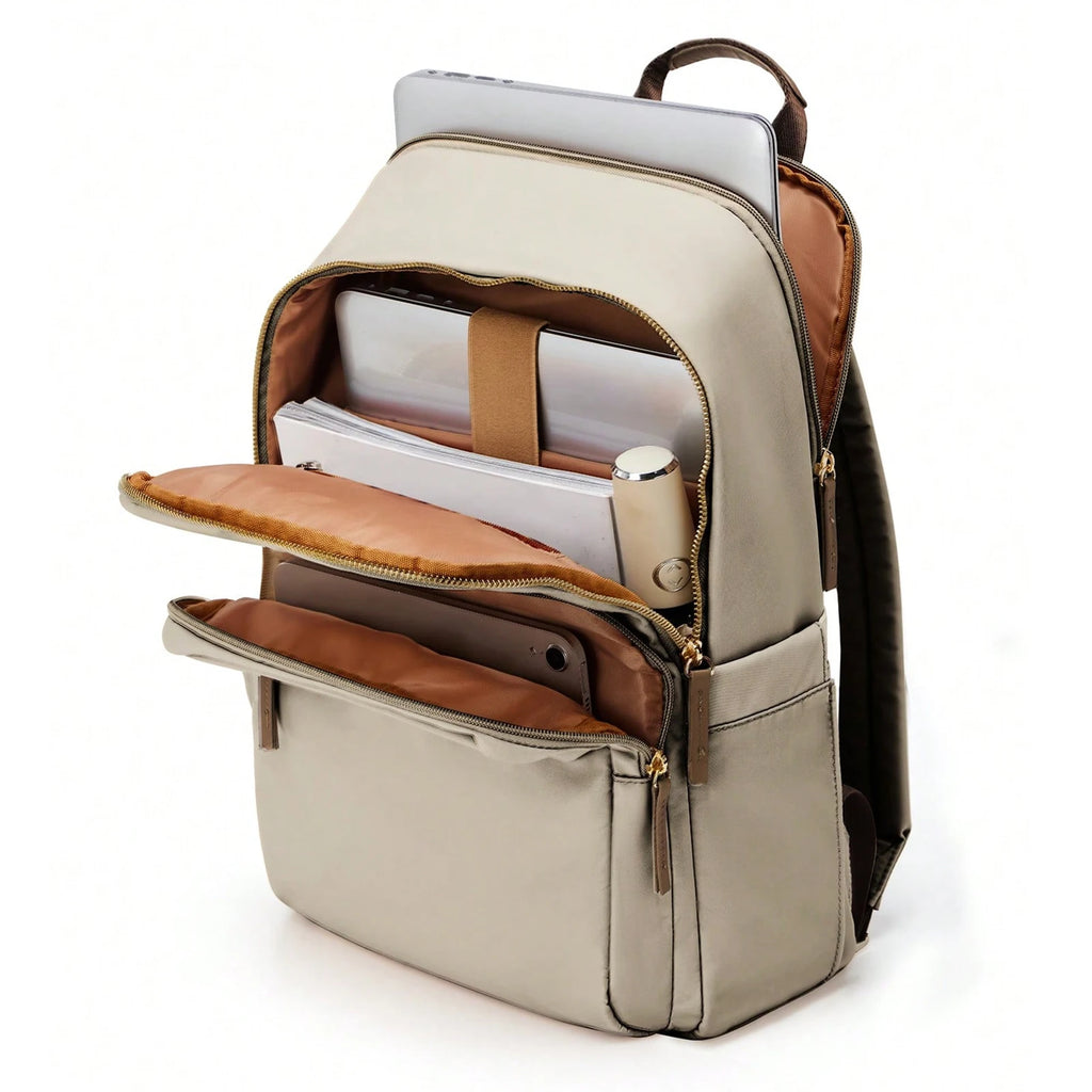 Beige backpack with brown accents open on a white background