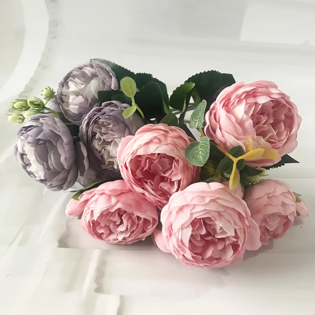 Add timeless beauty to your space with this stunning rose silk peony bouquet. Made with high-quality silk, it features 5 full peony blooms.
