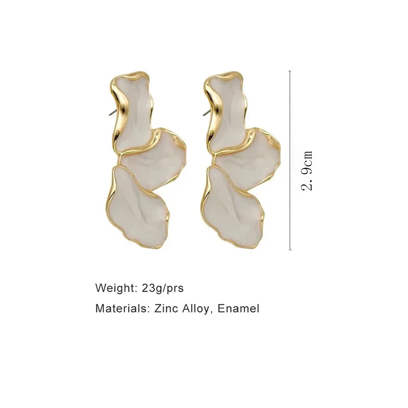 Pair of earrings with gold accents and white enamel, shown with dimensions and material details on a white background.