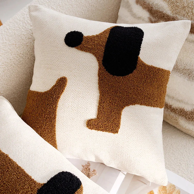Decorative pillow with a dog pattern on a soft surface