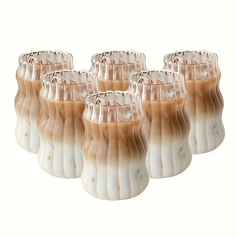 Set of glass tumblers with wavy design and gradient color
