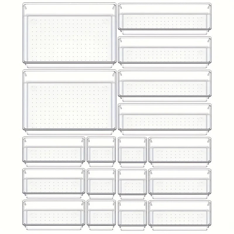 Set of clear plastic drawers with various sizes on a white background
