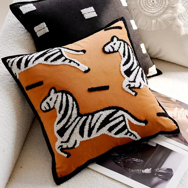 Decorative pillow with zebra pattern on a couch