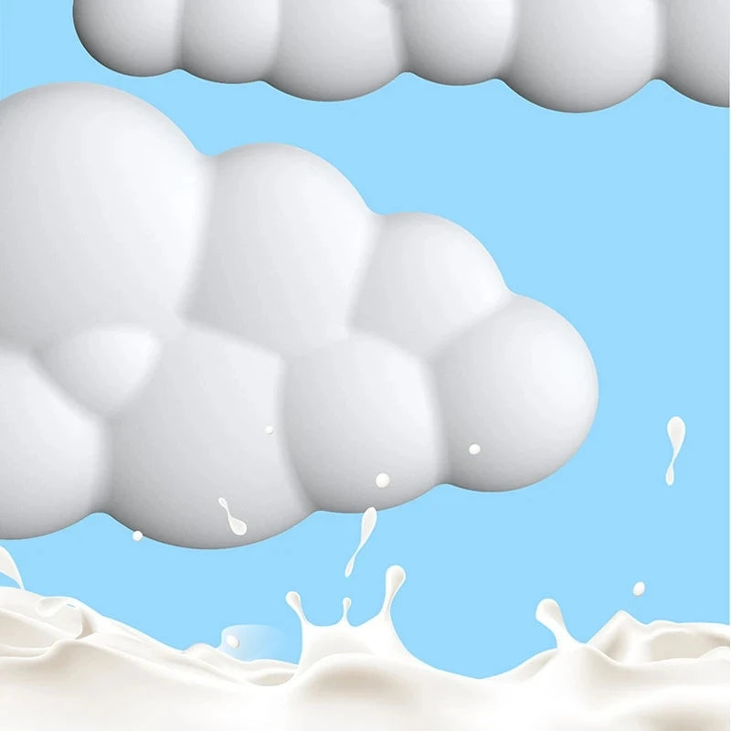 White clouds and splashes of milk against a blue sky