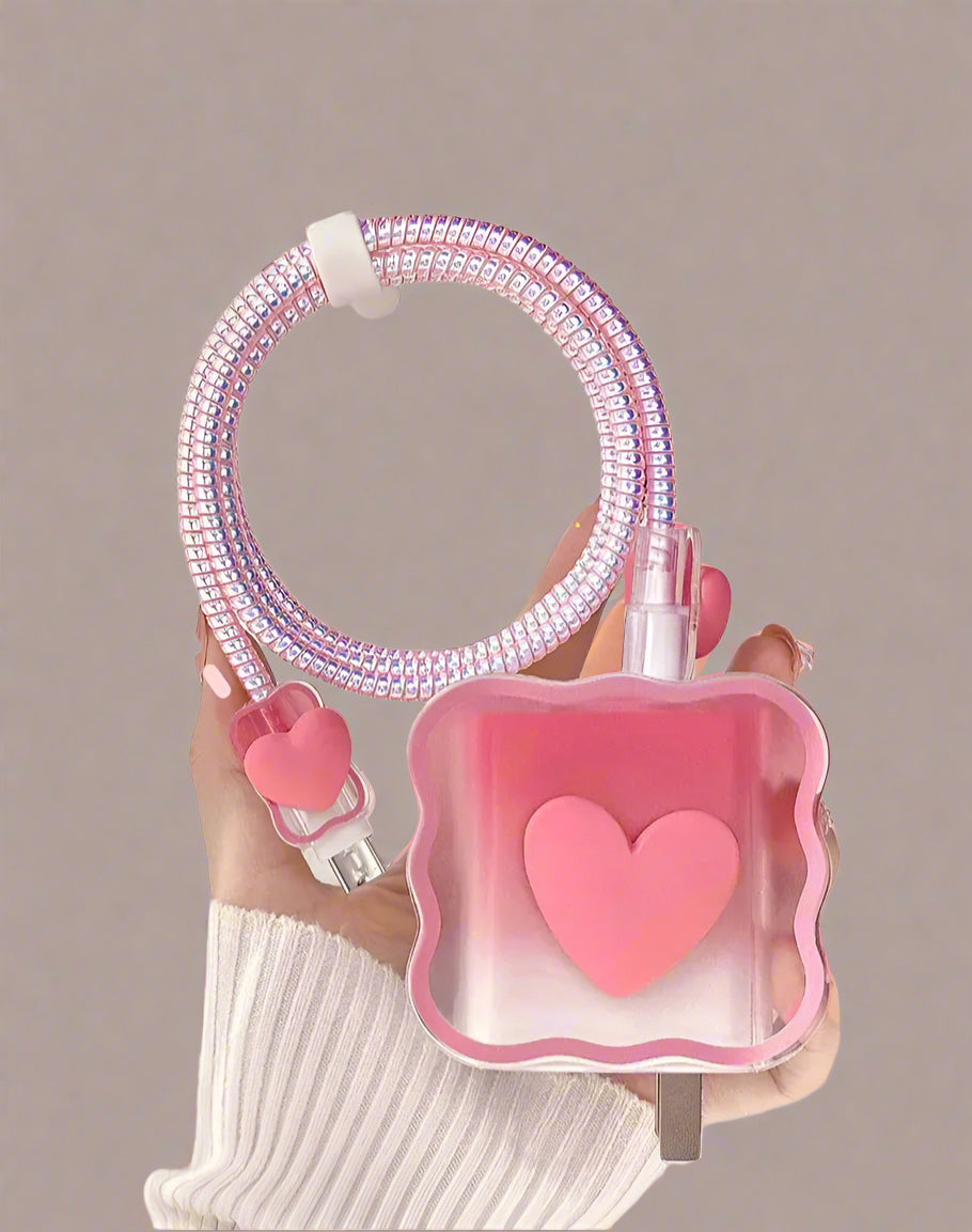 Pink heart-shaped charger head protective sleeve with a clear background