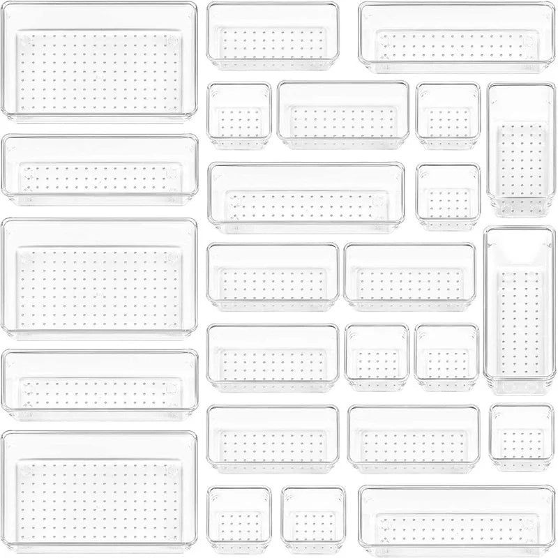 Set of clear plastic trays with various sizes on a white background