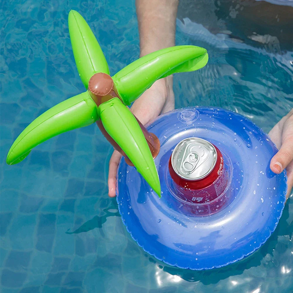 Bring tropical vibes to your next beach day or pool party with this Mini Coconut Tree & Flamingo Inflatable Drink Holder ! Made from durable PVC, it's lightweight, easy to inflate, and keeps your beverage floating right beside you.