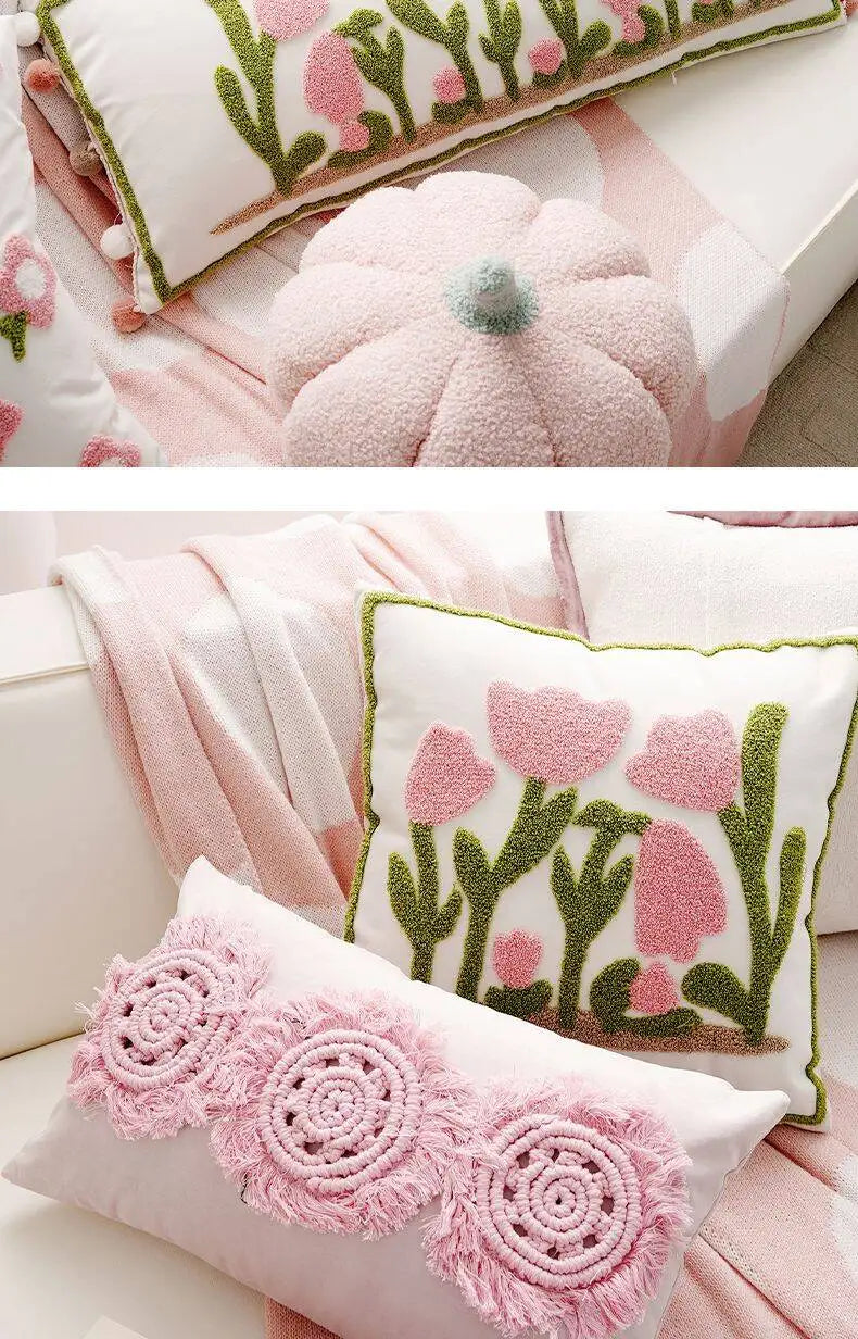 Decorative pillows with floral patterns on a couch