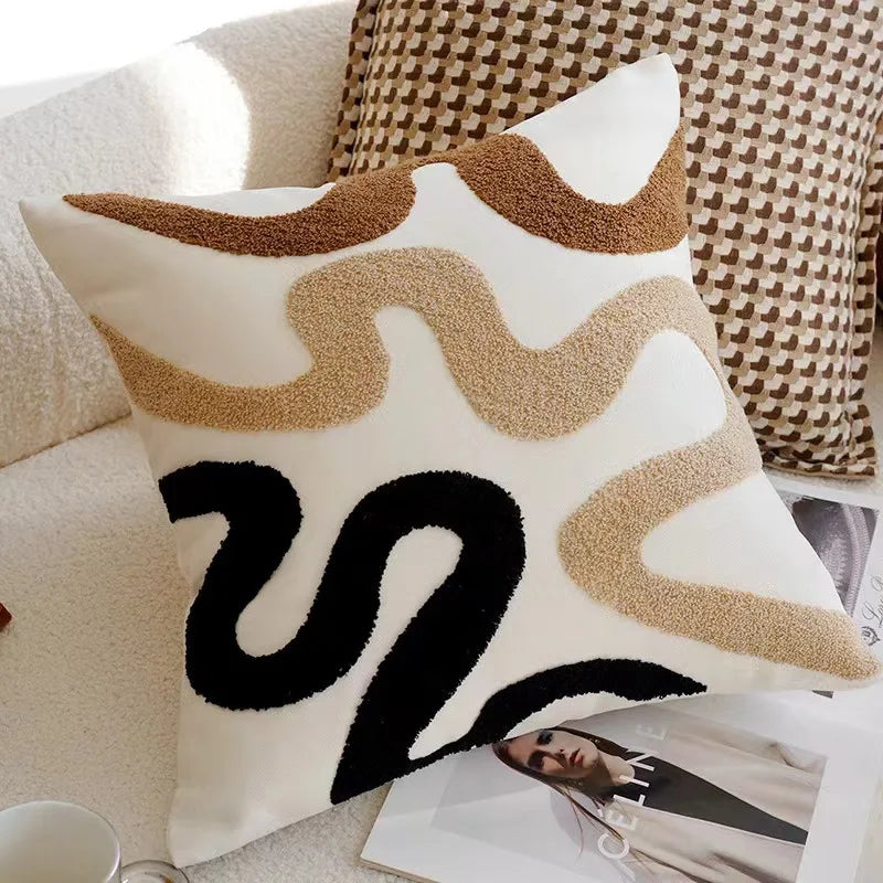 Decorative pillow with abstract pattern on a couch