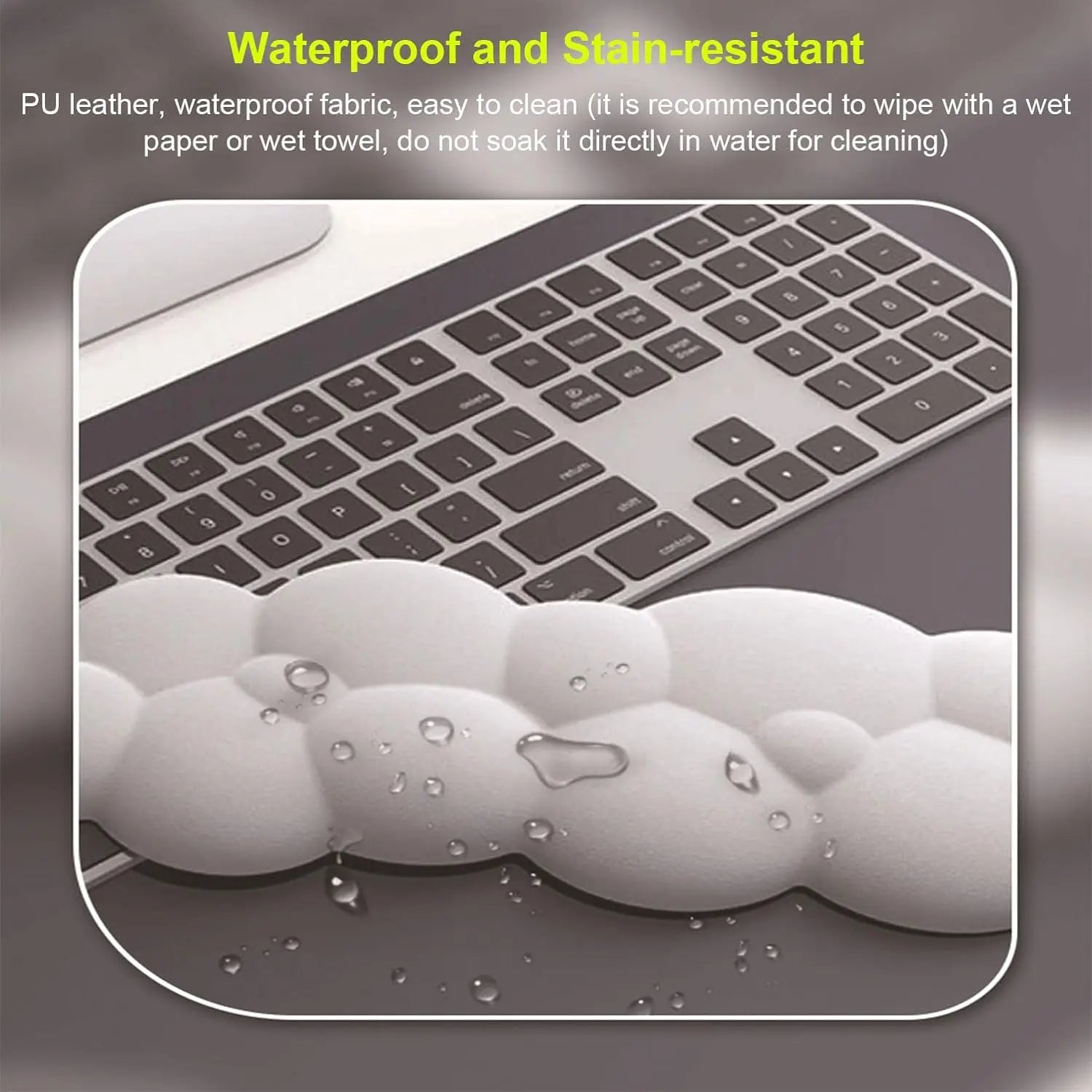 Keyboard with waterproof and stain-resistant feature text and water droplets on a gray background