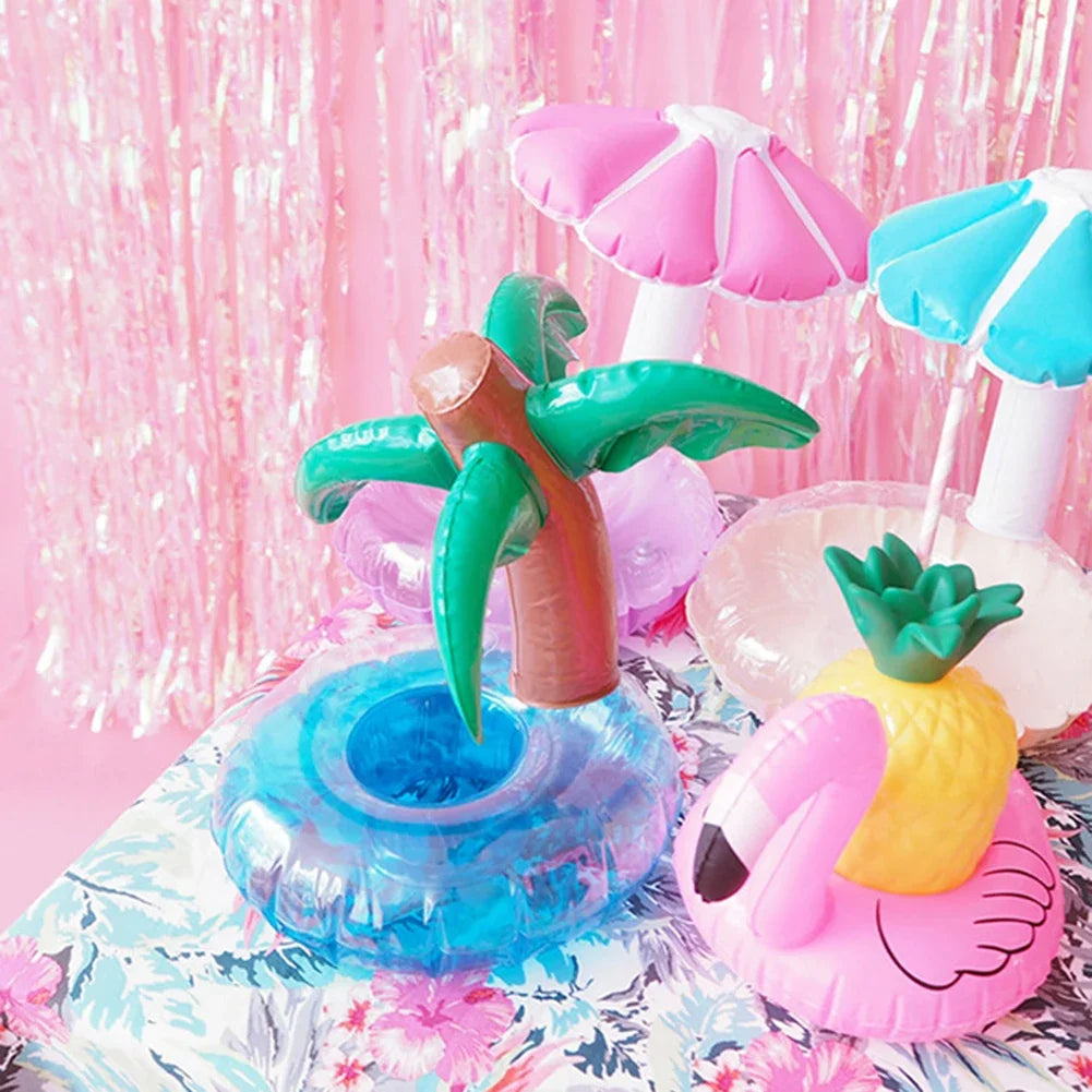 Bring tropical vibes to your next beach day or pool party with this Mini Coconut Tree & Flamingo Inflatable Drink Holder ! Made from durable PVC, it's lightweight, easy to inflate, and keeps your beverage floating right beside you.