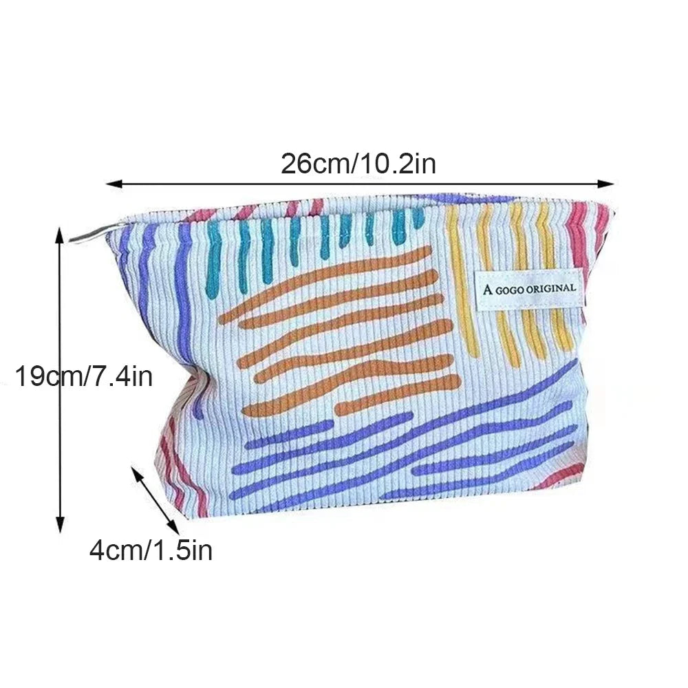 Multicolored patterned pouch with dimensions and 'A GoGo Original' label on a white background