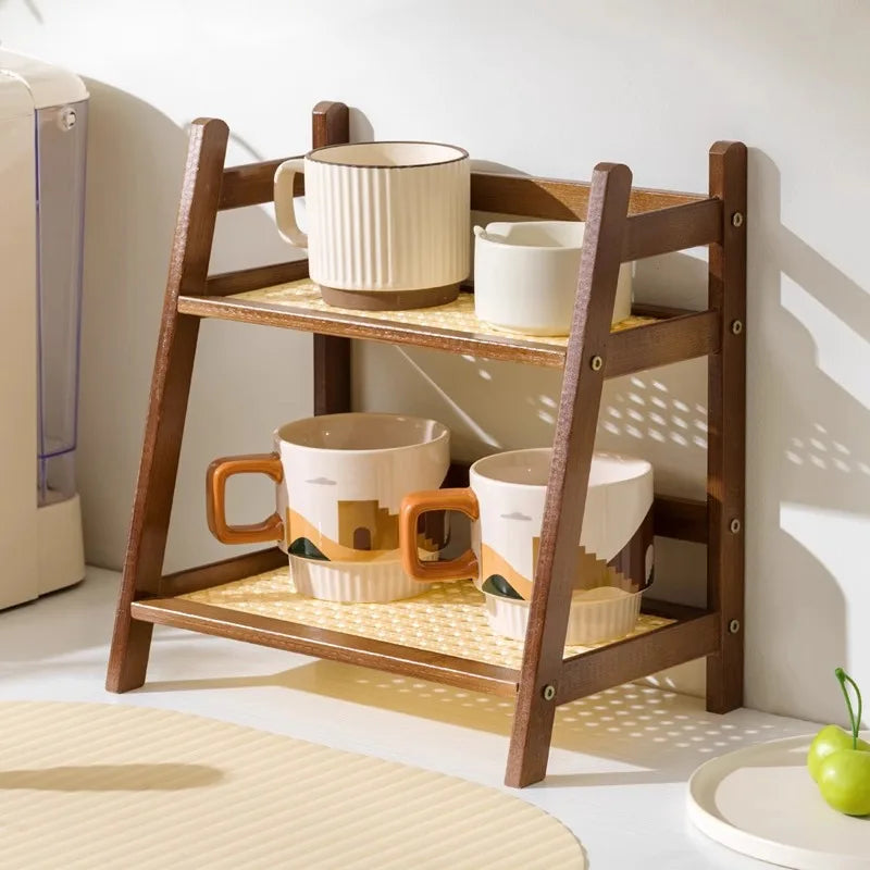 Wooden shelf with ceramic cups on a light-colored floor.