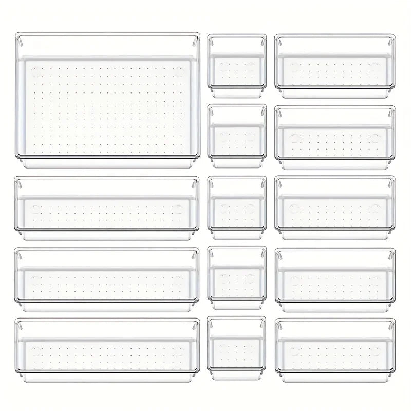 Set of clear plastic kitchen storage bins with various sizes on a white background