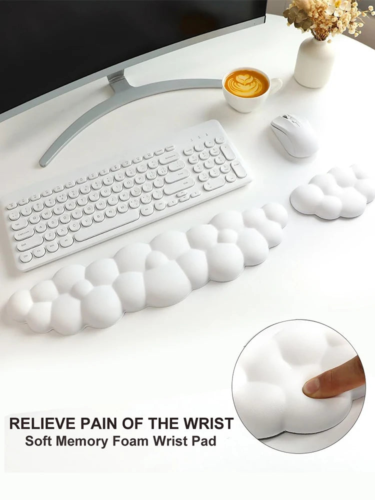 White wrist pad on a desk with a keyboard and mouse, featuring text 'Relieve Pain of the Wrist'.