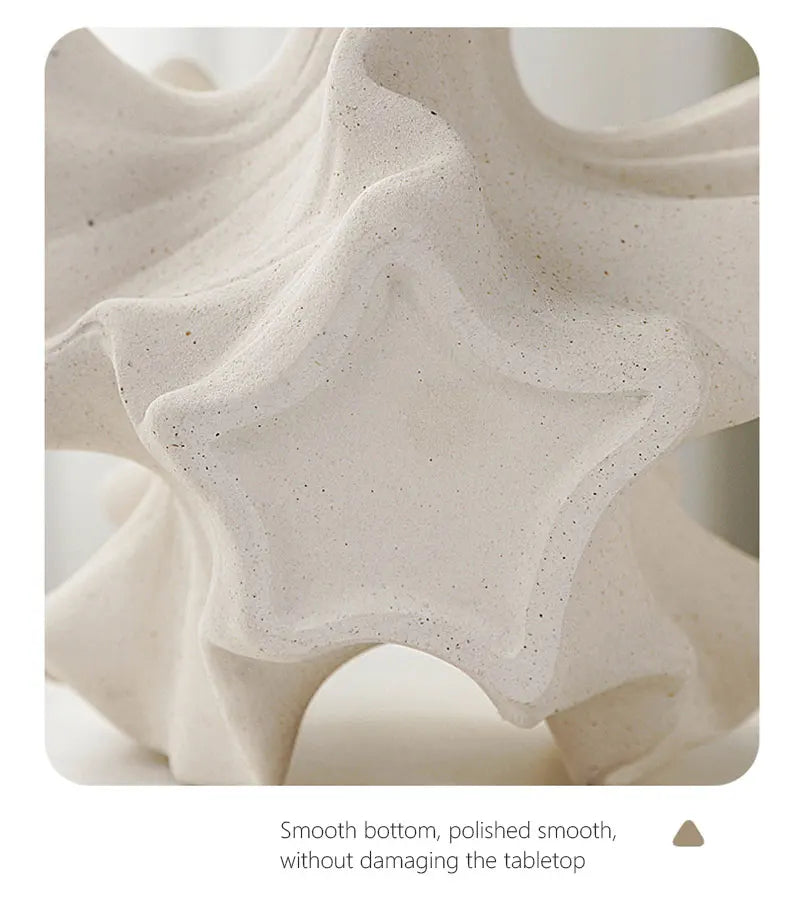 Close-up of a textured vase surface with a smooth bottom.