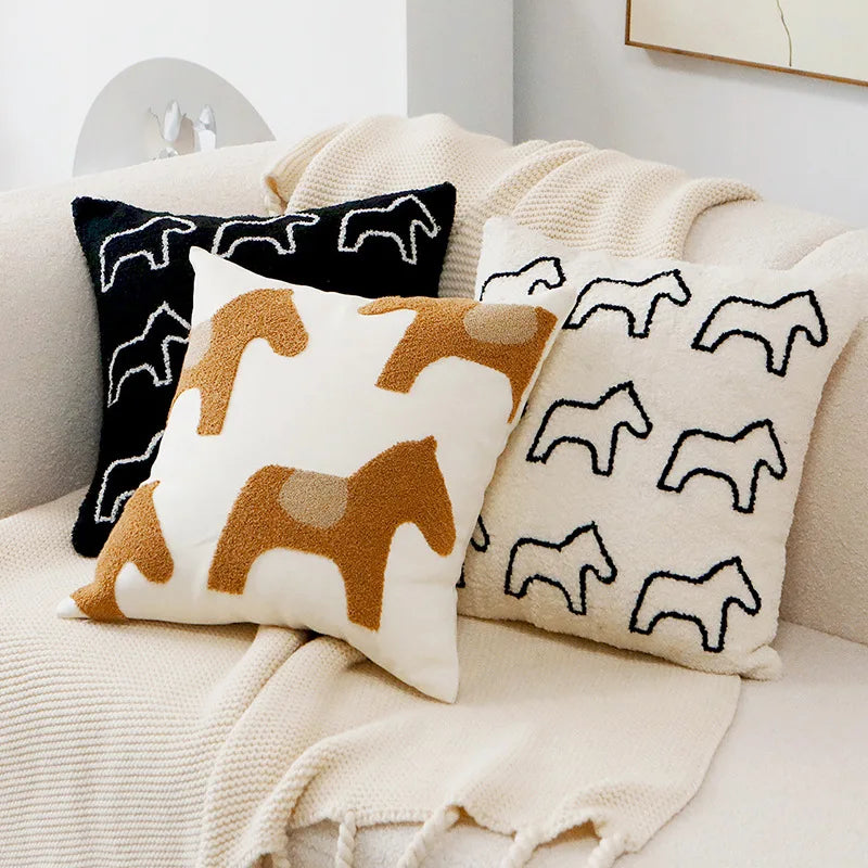 Decorative pillows with animal patterns on a couch