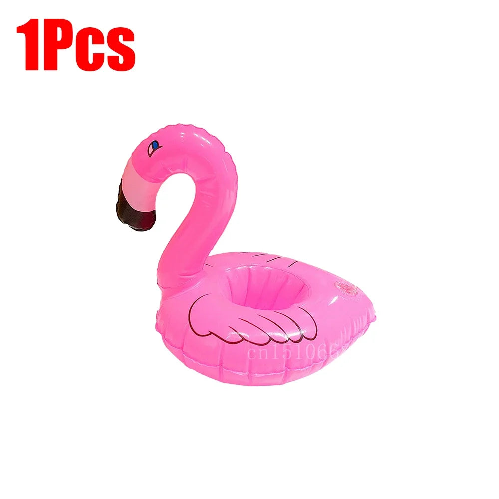 Bring tropical vibes to your next beach day or pool party with this Mini Coconut Tree & Flamingo Inflatable Drink Holder ! Made from durable PVC, it's lightweight, easy to inflate, and keeps your beverage floating right beside you.