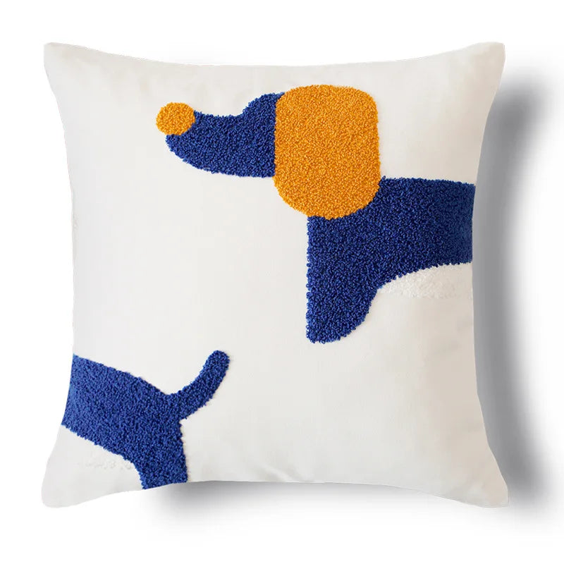 Decorative pillow with a dog pattern in blue and orange on a white background
