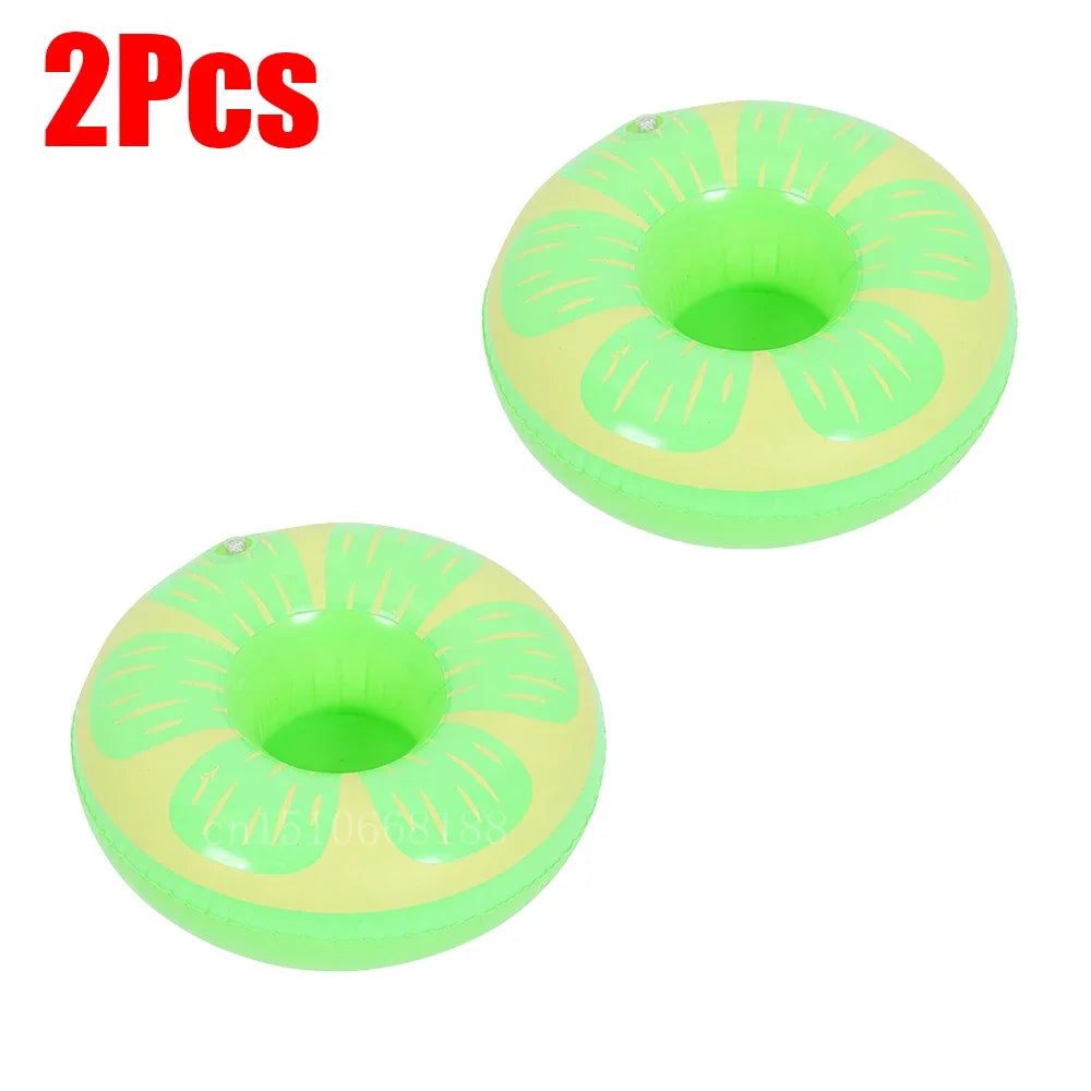 Bring tropical vibes to your next beach day or pool party with this Mini Coconut Tree & Flamingo Inflatable Drink Holder ! Made from durable PVC, it's lightweight, easy to inflate, and keeps your beverage floating right beside you.